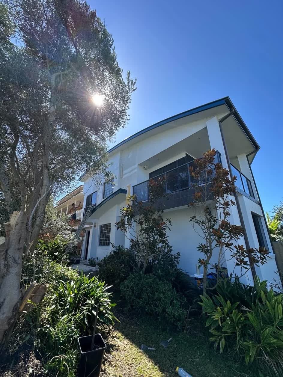 The same house finished in white