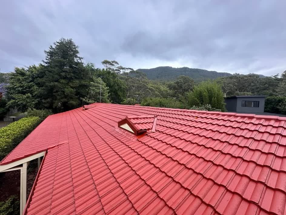 The roof recoated in bright terracotta red